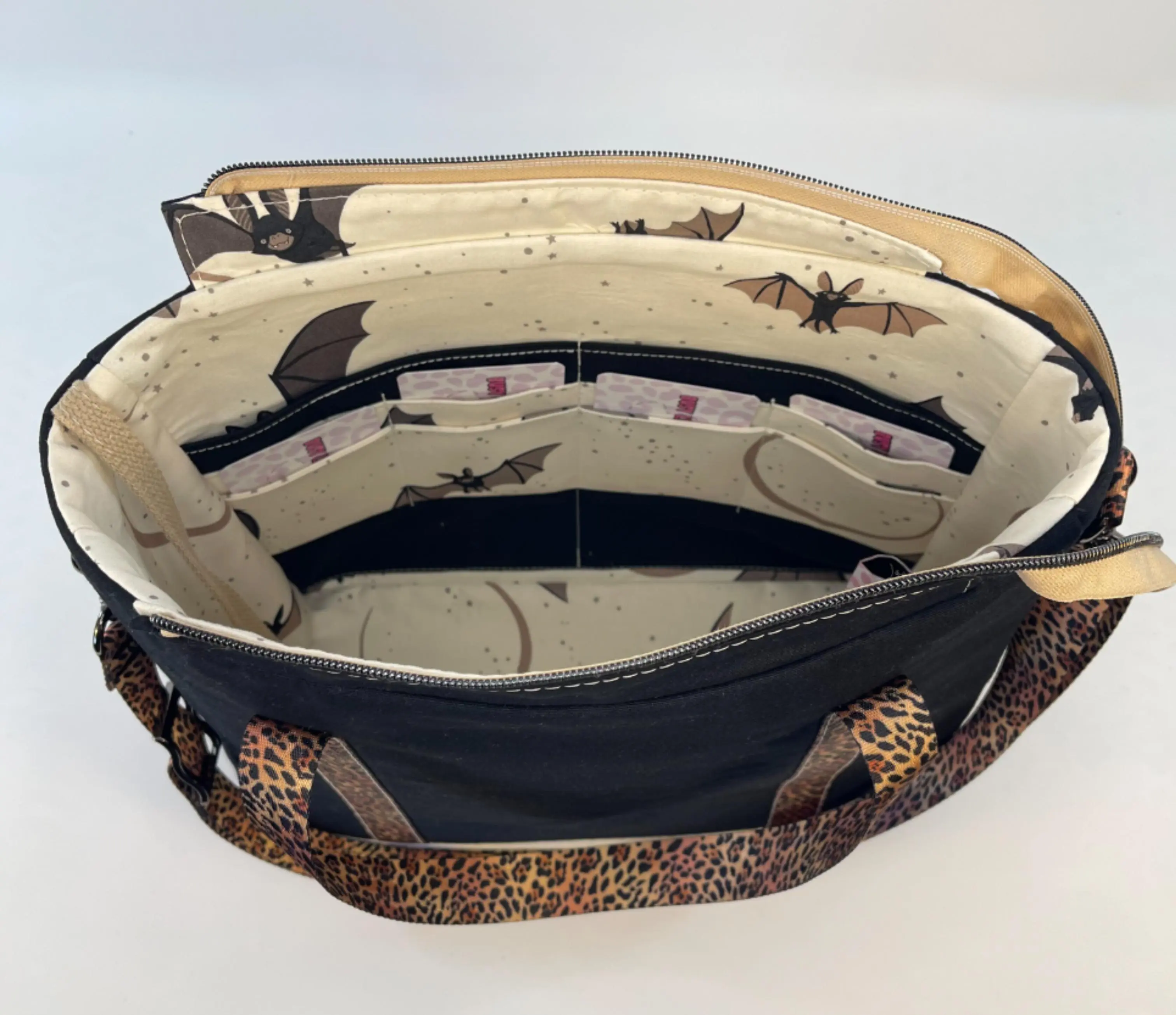 Inside Major Menace Tote showing multiple wallet pockets
